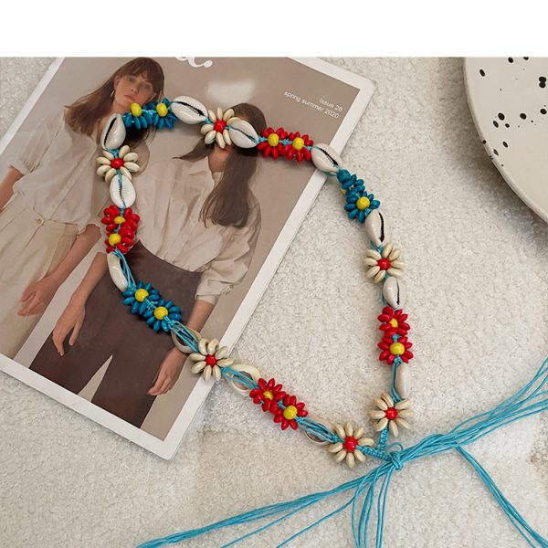 Bohemian sweet ethnic style waist belt with woven shell and bead design, featuring a stylish waistband.